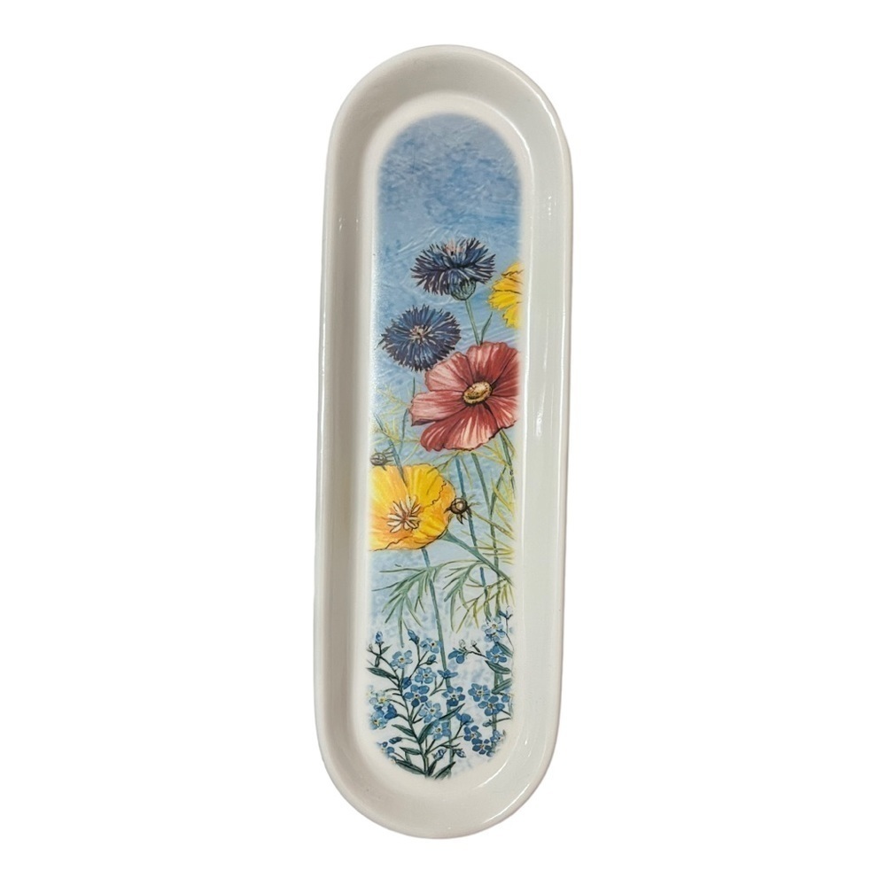 SPOON rest/ceramic tray in white with poppy floral in bottom of tray.